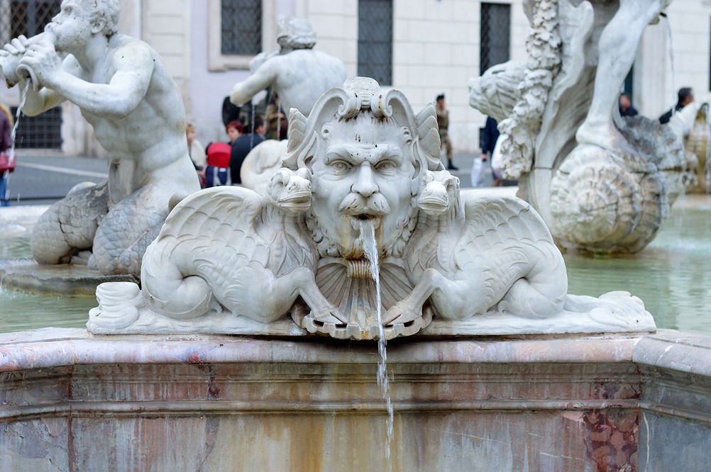 Mask on Fontana del Moro Rome