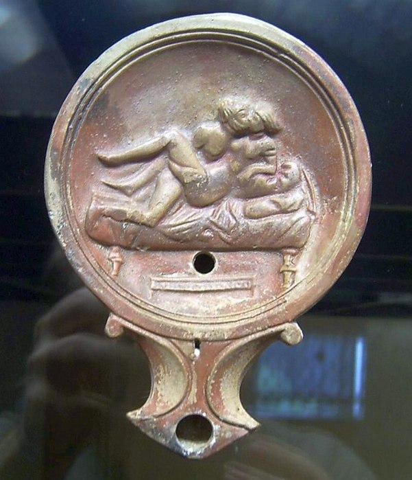 Oil lamp with couple performing Sexjpg