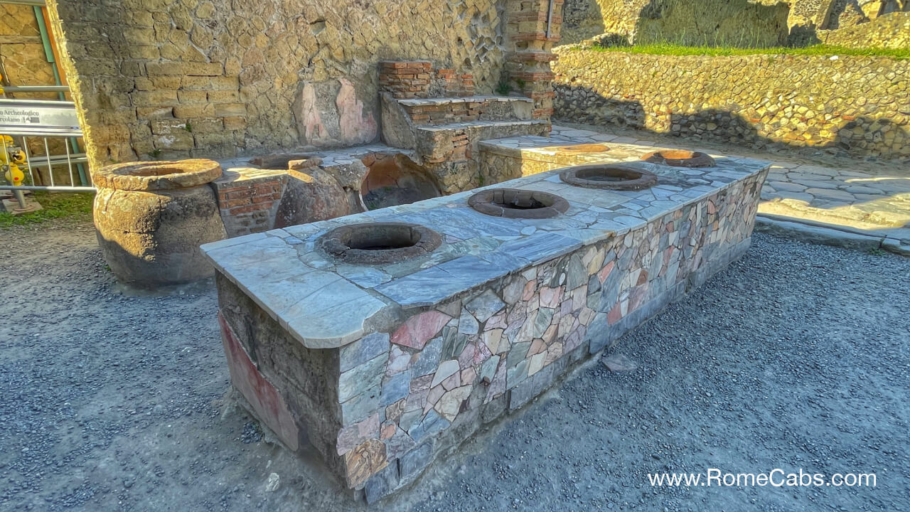 Thermapolium Herculaneum tours from Rome RomeCabs