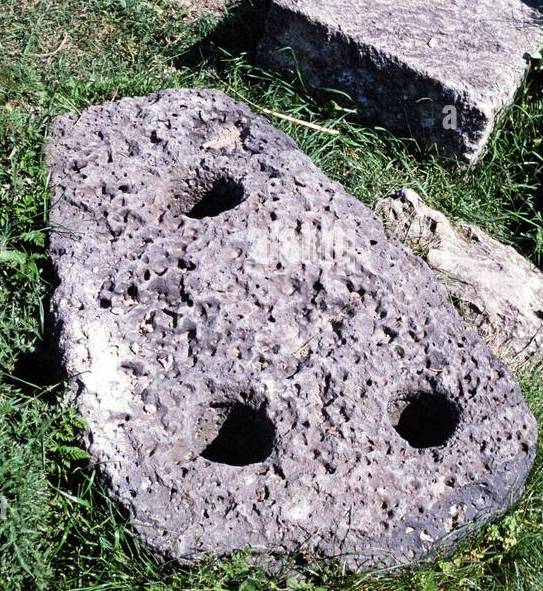 prehistoric archaeological site at ugarit syria in 1998 stone anchor in temple of baal